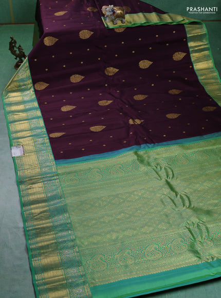 Pure gadwal silk saree deep jamun and green shade with zari woven buttas and zari woven border