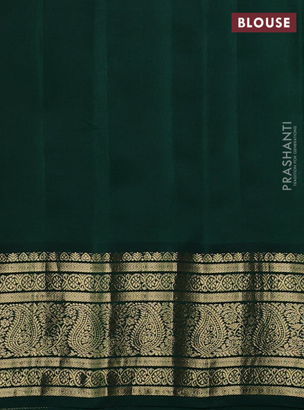 Pure gadwal silk saree off white and green with paisley zari woven buttas and temple design zari woven border