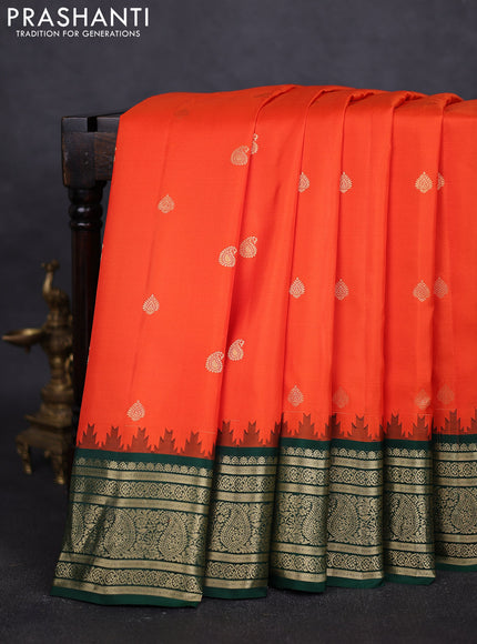 Pure gadwal silk saree orange and bottle green with paisley zari woven buttas and temple design zari woven border