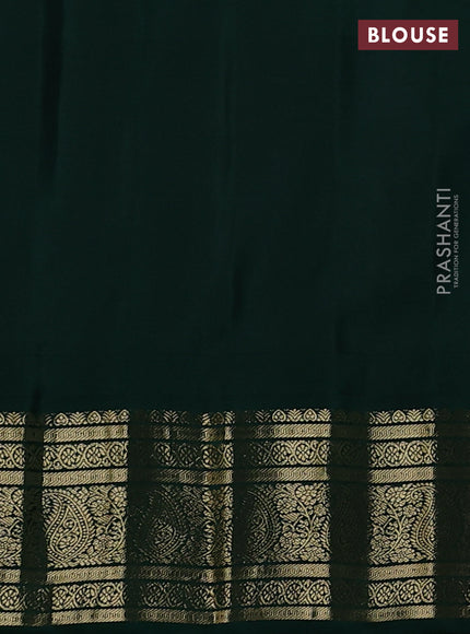 Pure gadwal silk saree orange and bottle green with paisley zari woven buttas and temple design zari woven border