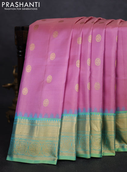 Pure gadwal silk saree pastel pink and green shade with paisley zari woven buttas and temple design zari woven border