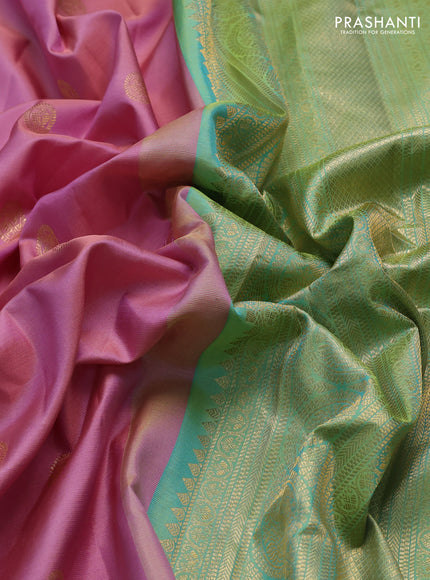 Pure gadwal silk saree pastel pink and green shade with paisley zari woven buttas and temple design zari woven border