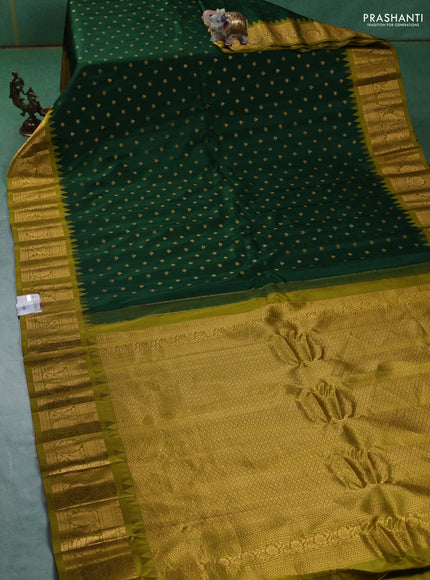Pure gadwal silk saree green and mehendi green with zari woven buttas and zari woven border