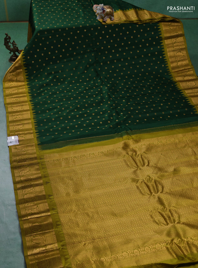 Pure gadwal silk saree green and mehendi green with zari woven buttas and zari woven border