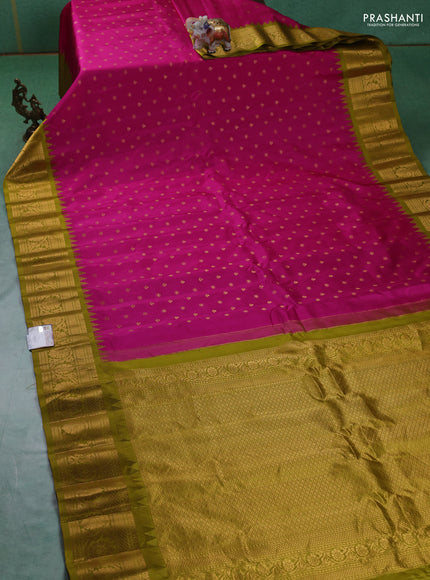 Pure gadwal silk saree pink and mehendi green with zari woven buttas and zari woven border