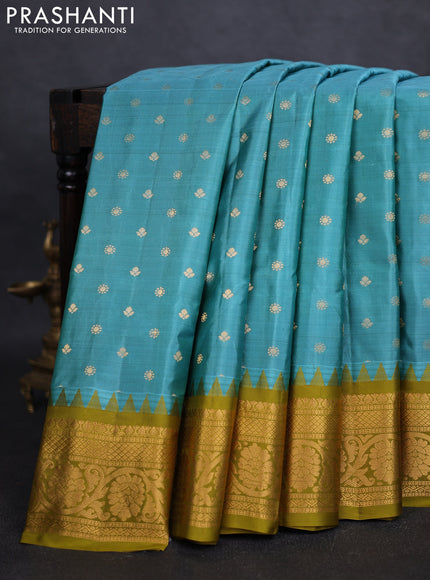 Pure gadwal silk saree teal blue and mehendi green with zari woven buttas and zari woven border