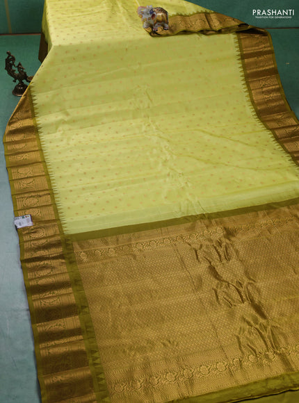 Pure gadwal silk saree lime yellow and mehendi green with zari woven buttas and zari woven border