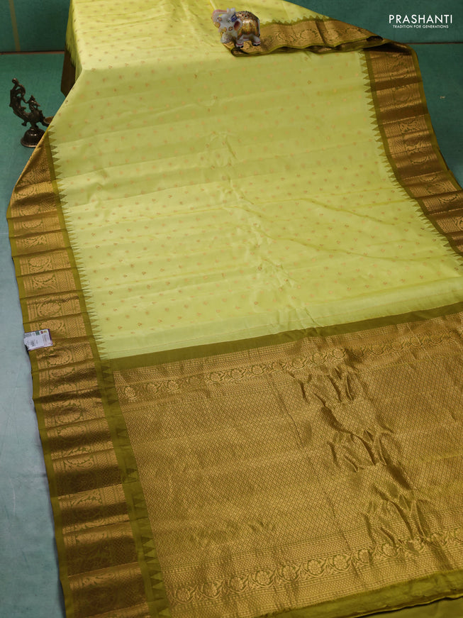 Pure gadwal silk saree lime yellow and mehendi green with zari woven buttas and zari woven border