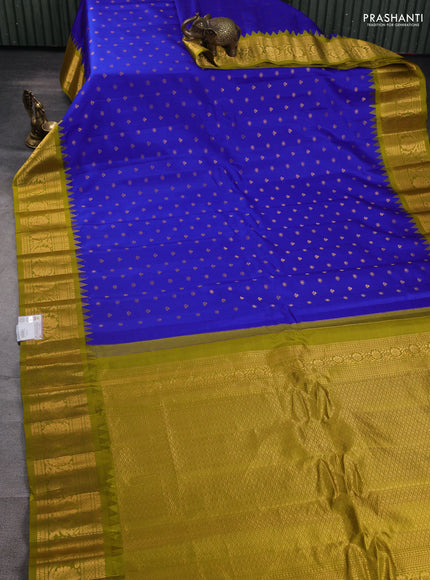 Pure gadwal silk saree royal blue and mehendi green with zari woven buttas and temple design zari woven border