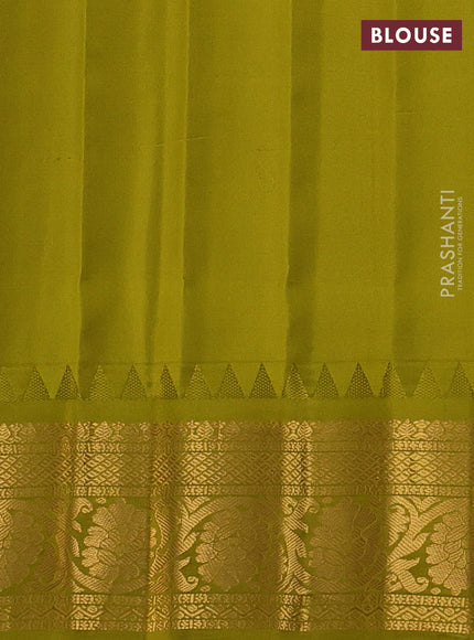 Pure gadwal silk saree cream and mehendi green with zari woven buttas and temple design zari woven border