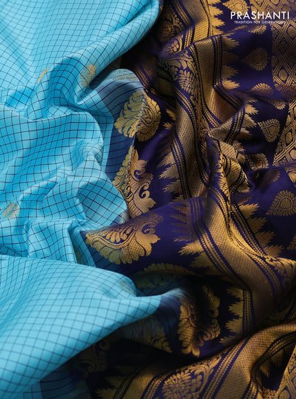 Pure gadwal silk saree light blue and navy blue with allover checks & buttas and temple design zari woven border