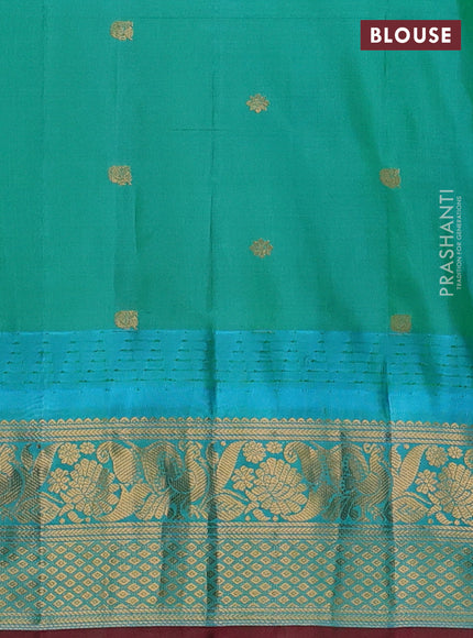 Pure gadwal silk saree purple and teal green with allover checks & buttas and temple design zari woven border