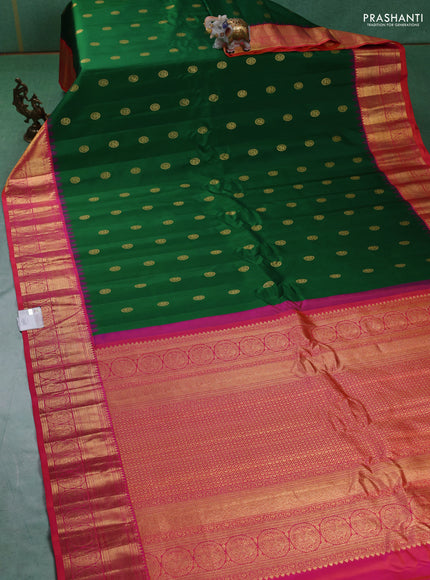 Pure gadwal silk saree green and dual shade of pinkish orange with zari woven buttas and temple design zari woven border