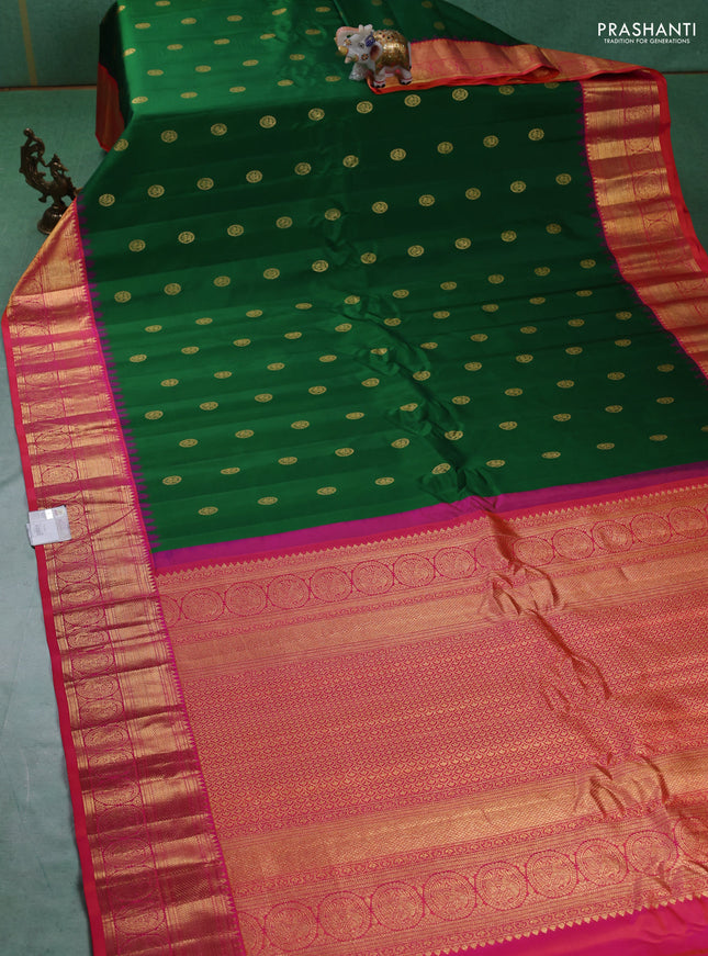 Pure gadwal silk saree green and dual shade of pinkish orange with zari woven buttas and temple design zari woven border
