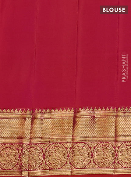 Pure gadwal silk saree green and dual shade of pinkish orange with zari woven buttas and temple design zari woven border