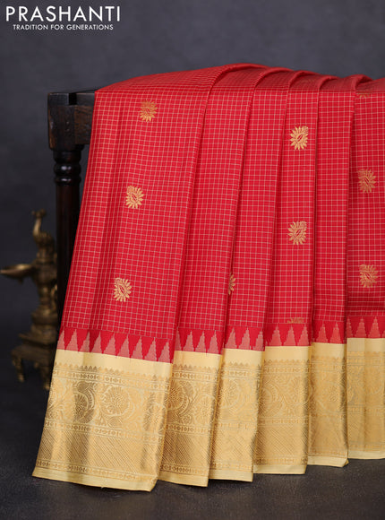 Pure gadwal silk saree red and pale yellow with allover checks & buttas and temple design zari woven border