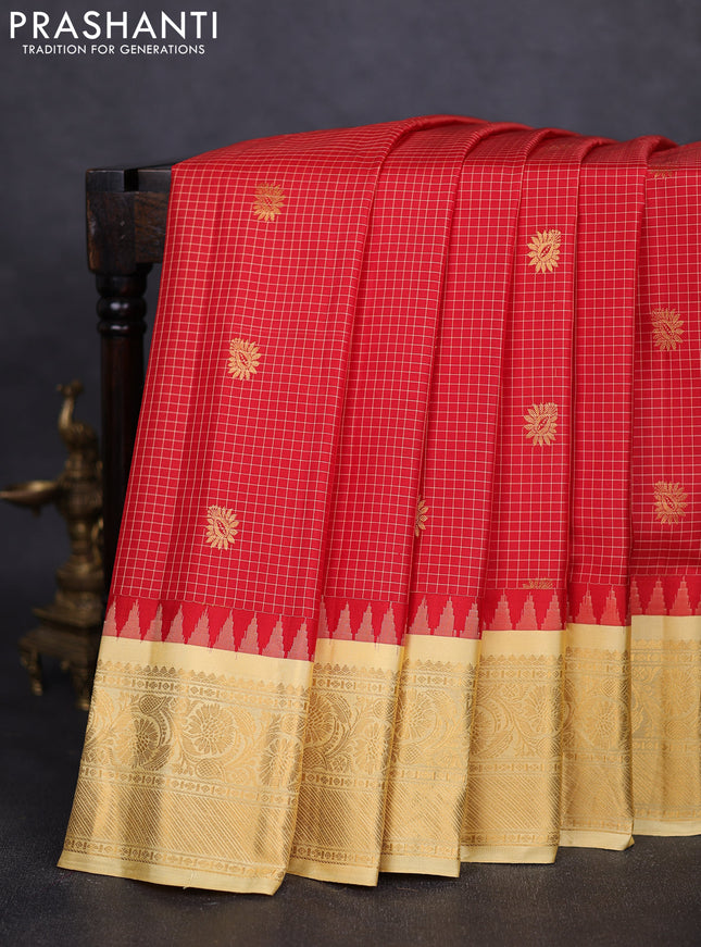 Pure gadwal silk saree red and pale yellow with allover checks & buttas and temple design zari woven border