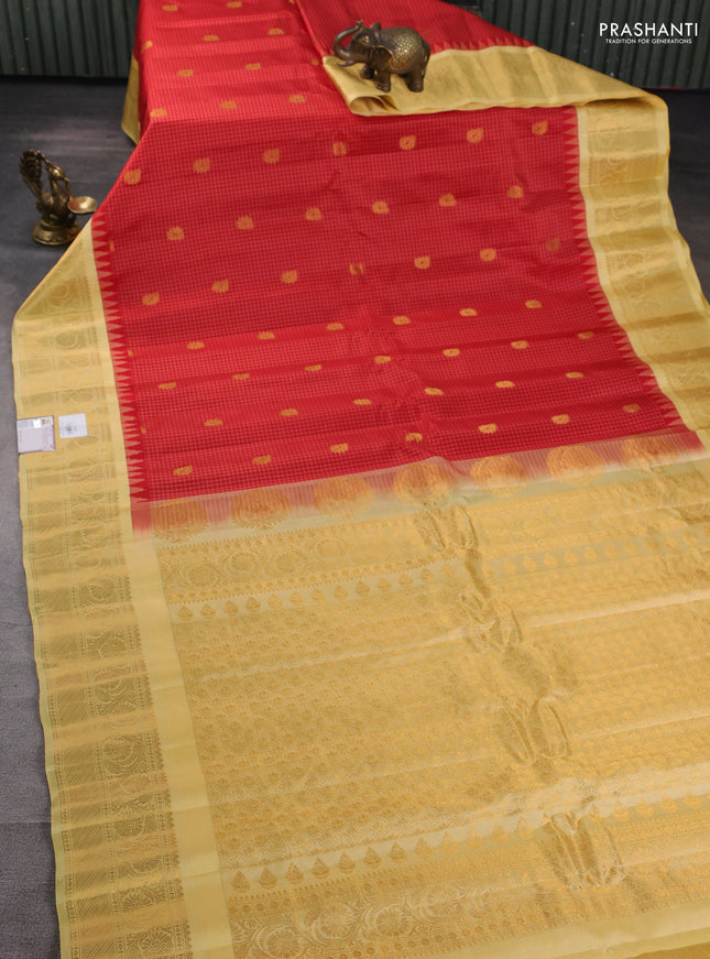 Pure gadwal silk saree red and pale yellow with allover checks & buttas and temple design zari woven border
