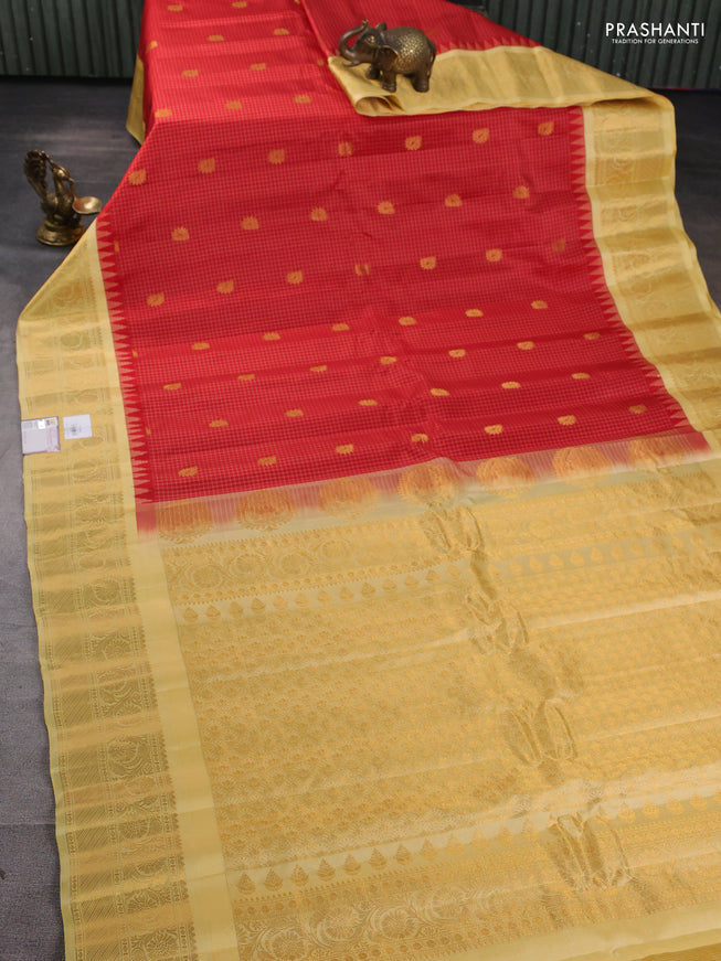 Pure gadwal silk saree red and pale yellow with allover checks & buttas and temple design zari woven border