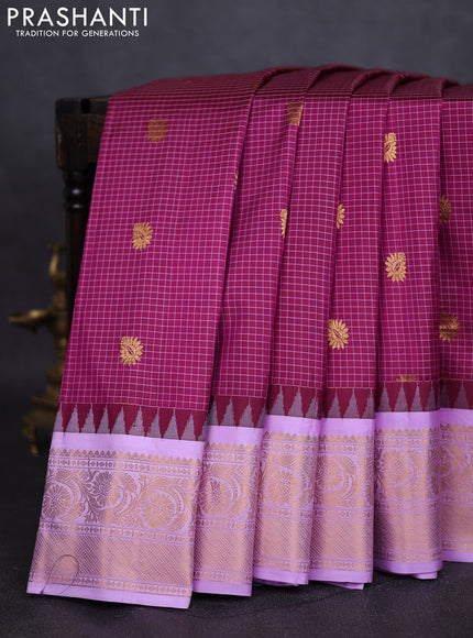 Pure gadwal silk saree purple and lavender with allover checks & buttas and temple design zari woven border