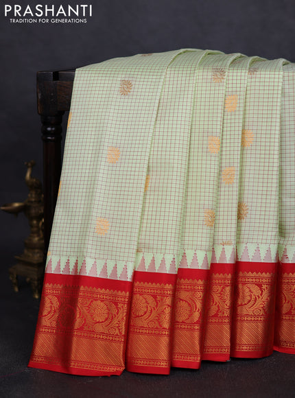 Pure gadwal silk saree pista green and red with allover checks & buttas and temple design zari woven border