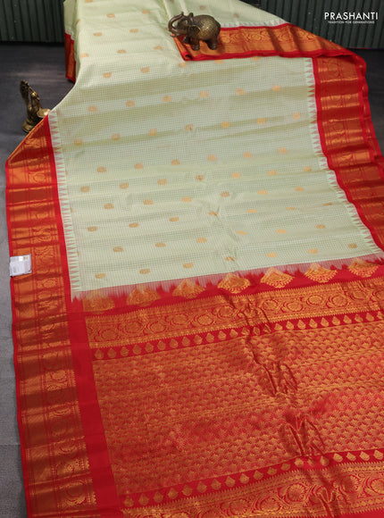 Pure gadwal silk saree pista green and red with allover checks & buttas and temple design zari woven border