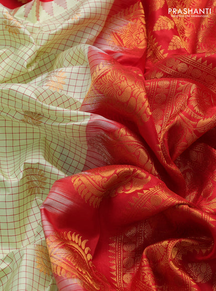 Pure gadwal silk saree pista green and red with allover checks & buttas and temple design zari woven border
