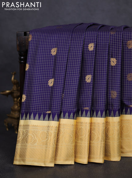 Pure gadwal silk saree navy blue and yellow with allover checks & buttas and temple design zari woven border