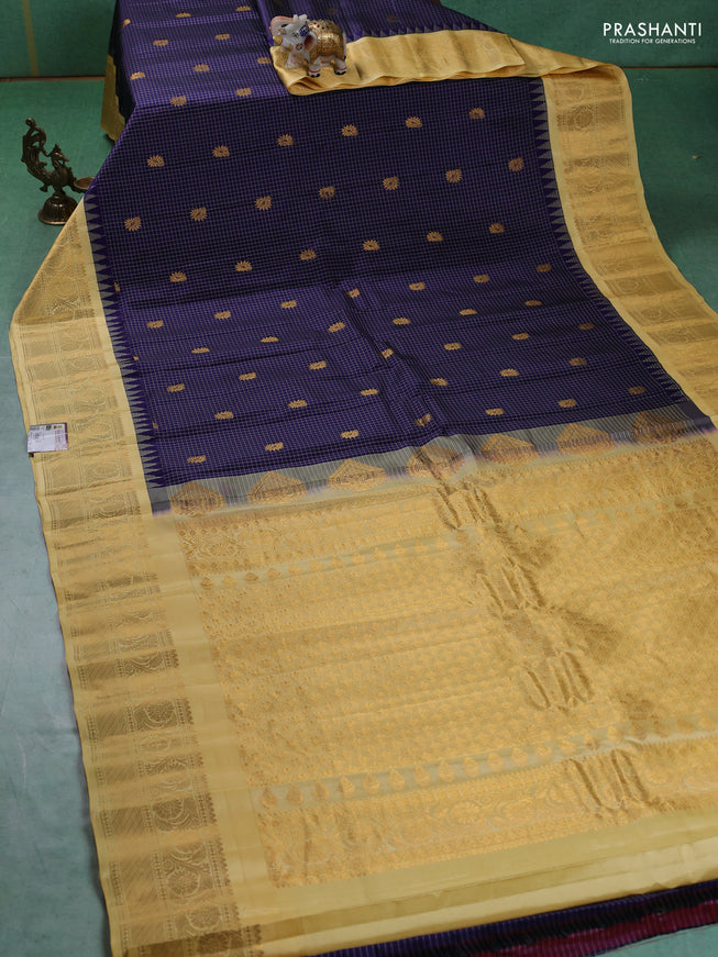 Pure gadwal silk saree navy blue and yellow with allover checks & buttas and temple design zari woven border