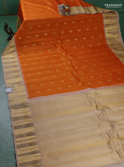 Pure gadwal silk saree orange and beige with zari woven buttas and temple design zari woven border
