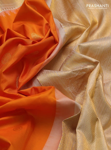 Pure gadwal silk saree orange and beige with zari woven buttas and temple design zari woven border