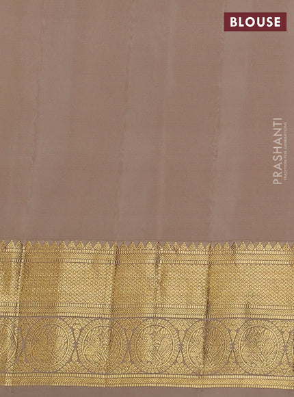Pure gadwal silk saree orange and beige with zari woven buttas and temple design zari woven border