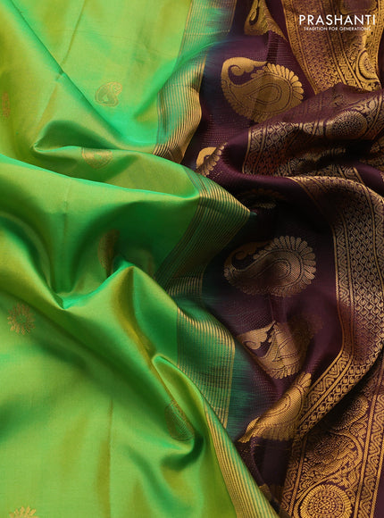 Pure gadwal silk saree light green and deep coffee brown with zari woven buttas and temple design zari woven border