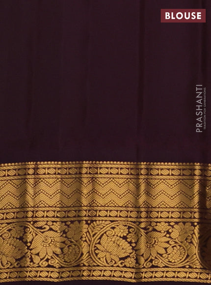 Pure gadwal silk saree light green and deep coffee brown with zari woven buttas and temple design zari woven border