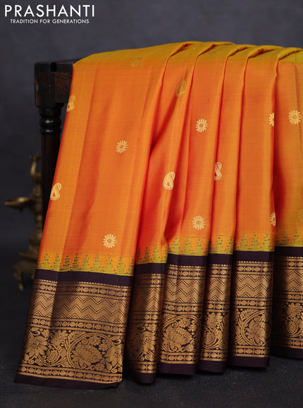 Pure gadwal silk saree mustard yellow and deep jamun with zari woven paisley buttas and temple design zari woven border