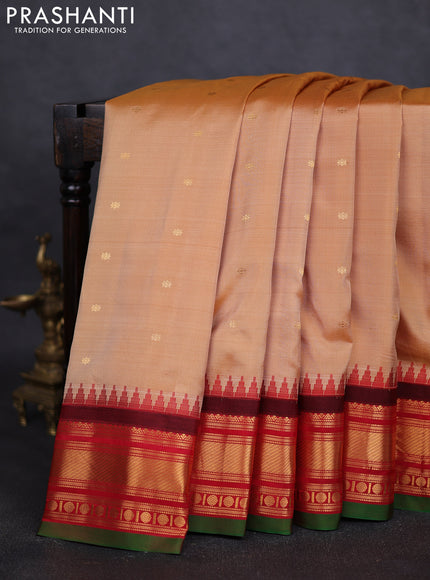 Pure gadwal silk saree sandal and red with zari woven buttas and zari woven border