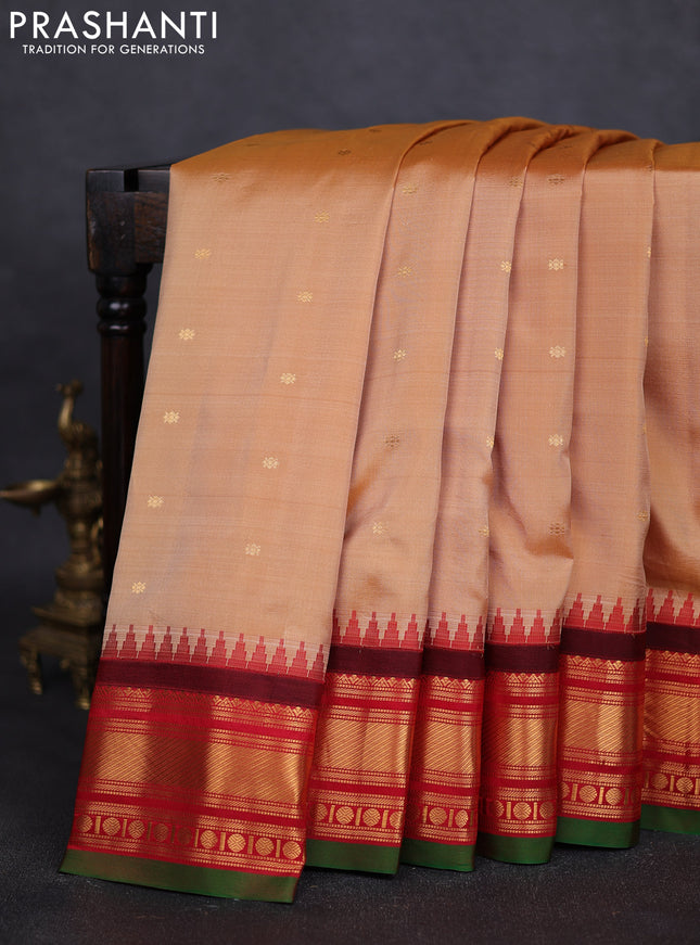 Pure gadwal silk saree sandal and red with zari woven buttas and zari woven border