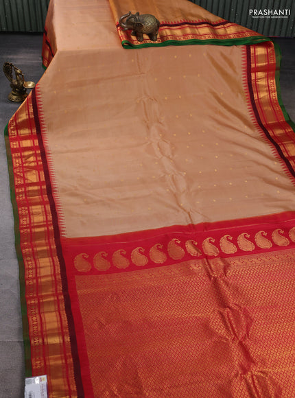 Pure gadwal silk saree sandal and red with zari woven buttas and zari woven border