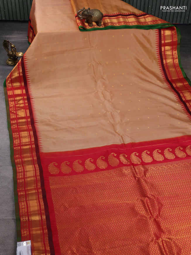 Pure gadwal silk saree sandal and red with zari woven buttas and zari woven border