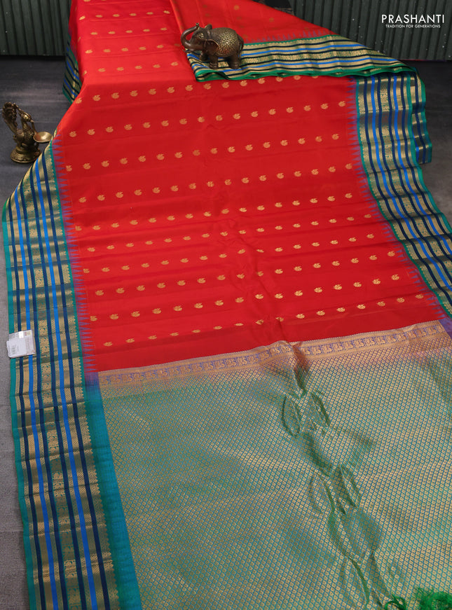 Pure gadwal silk saree red and teal green with annam zari woven buttas and temple design zari woven border