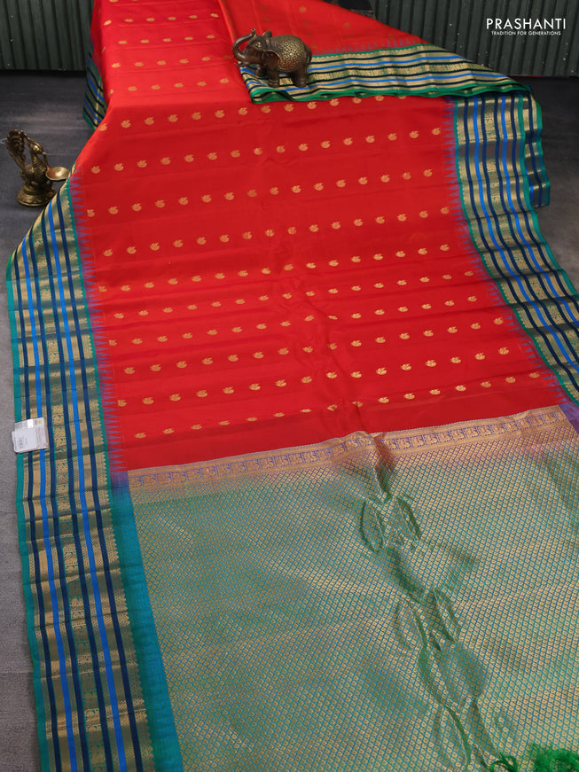 Pure gadwal silk saree red and teal green with annam zari woven buttas and temple design zari woven border