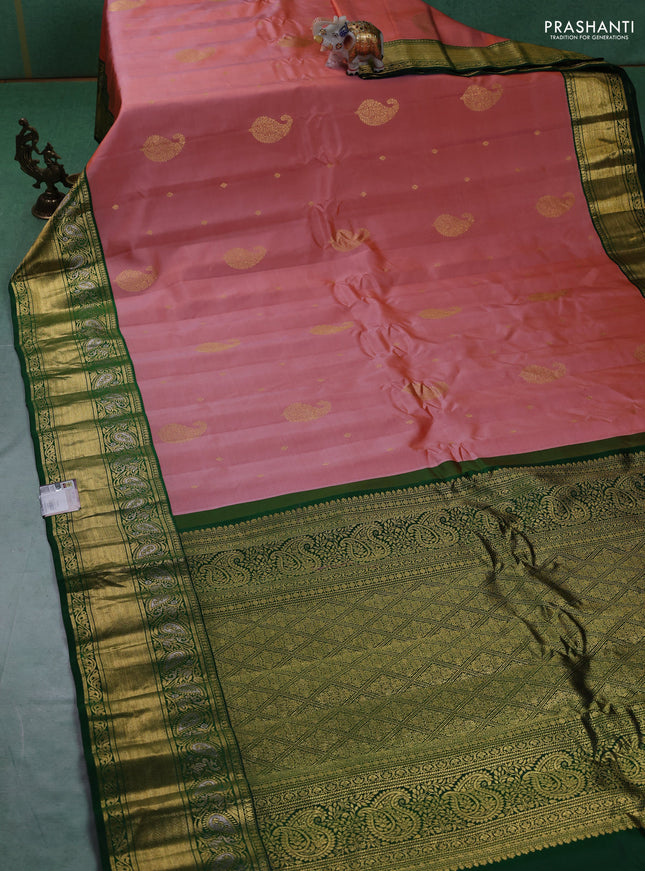 Pure gadwal silk saree rust shade and green with zari woven buttas and zari woven border