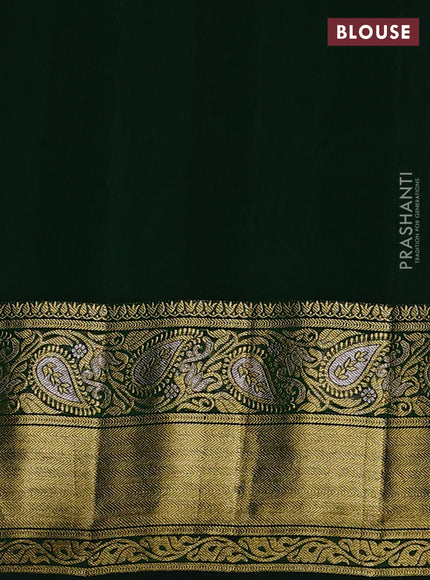 Pure gadwal silk saree rust shade and green with zari woven buttas and zari woven border