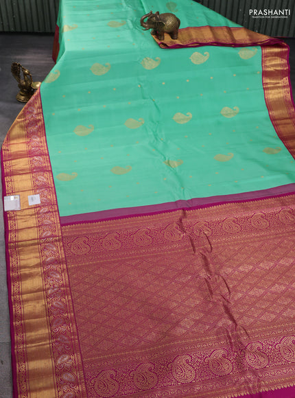 Pure gadwal silk saree teal green and purple with zari woven buttas and zari woven border