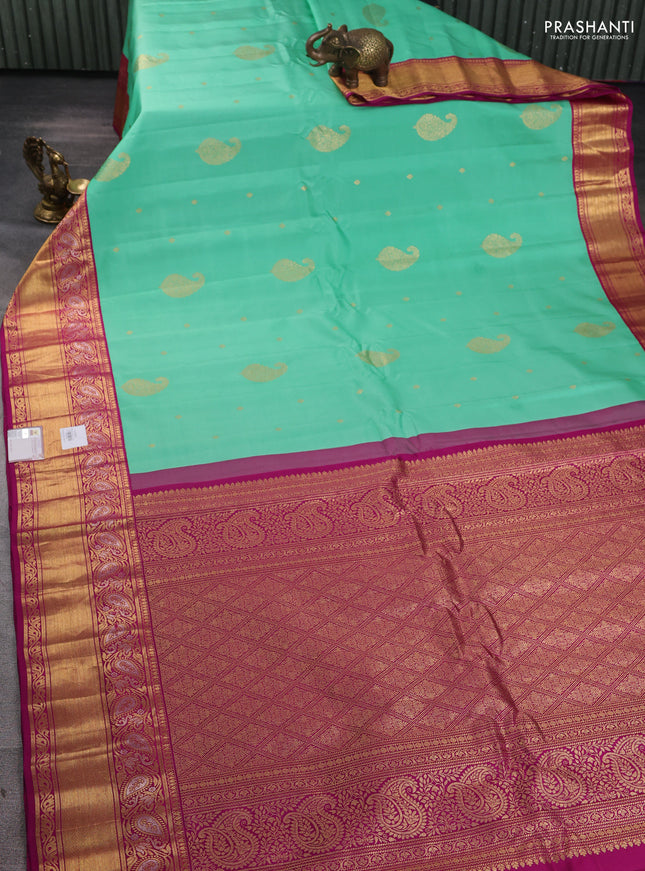 Pure gadwal silk saree teal green and purple with zari woven buttas and zari woven border