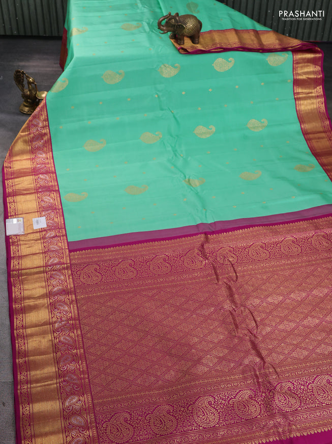 Pure gadwal silk saree teal green and purple with zari woven buttas and zari woven border