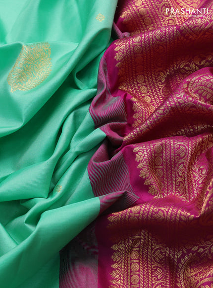 Pure gadwal silk saree teal green and purple with zari woven buttas and zari woven border