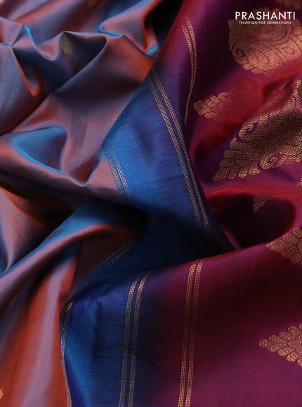 Pure gadwal silk saree dual shade of rust and dual shade of maroon with allover zari woven buttas and temple design zari woven border