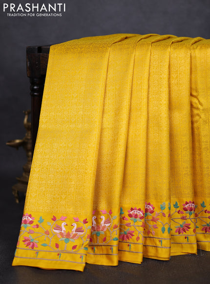 Pure kanchipuram silk saree yellow with allover zari checks & buttas and embroidery border