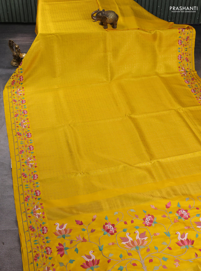Pure kanchipuram silk saree yellow with allover zari checks & buttas and embroidery border